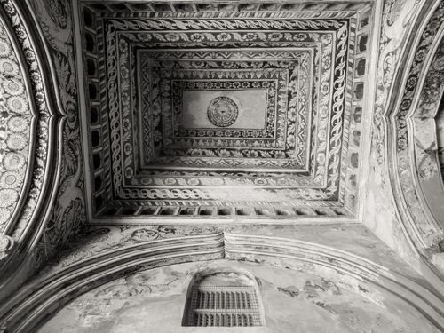 Free Detailed view of the historic carved ceiling in the Maratha Palace, Thanjavur. Stock Photo