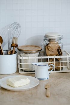 A cozy kitchen counter with baking ingredients and utensils, perfect for home cooks.