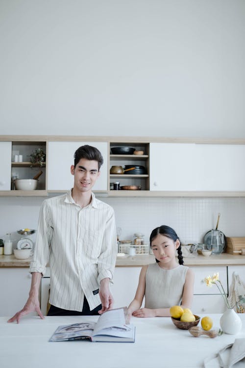 A Man and his Daughter in a Kitchen