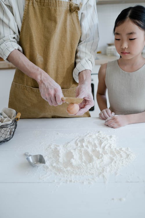 Dad and daughter baking