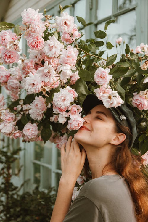 Beautiful Woman Near Pink Flowers