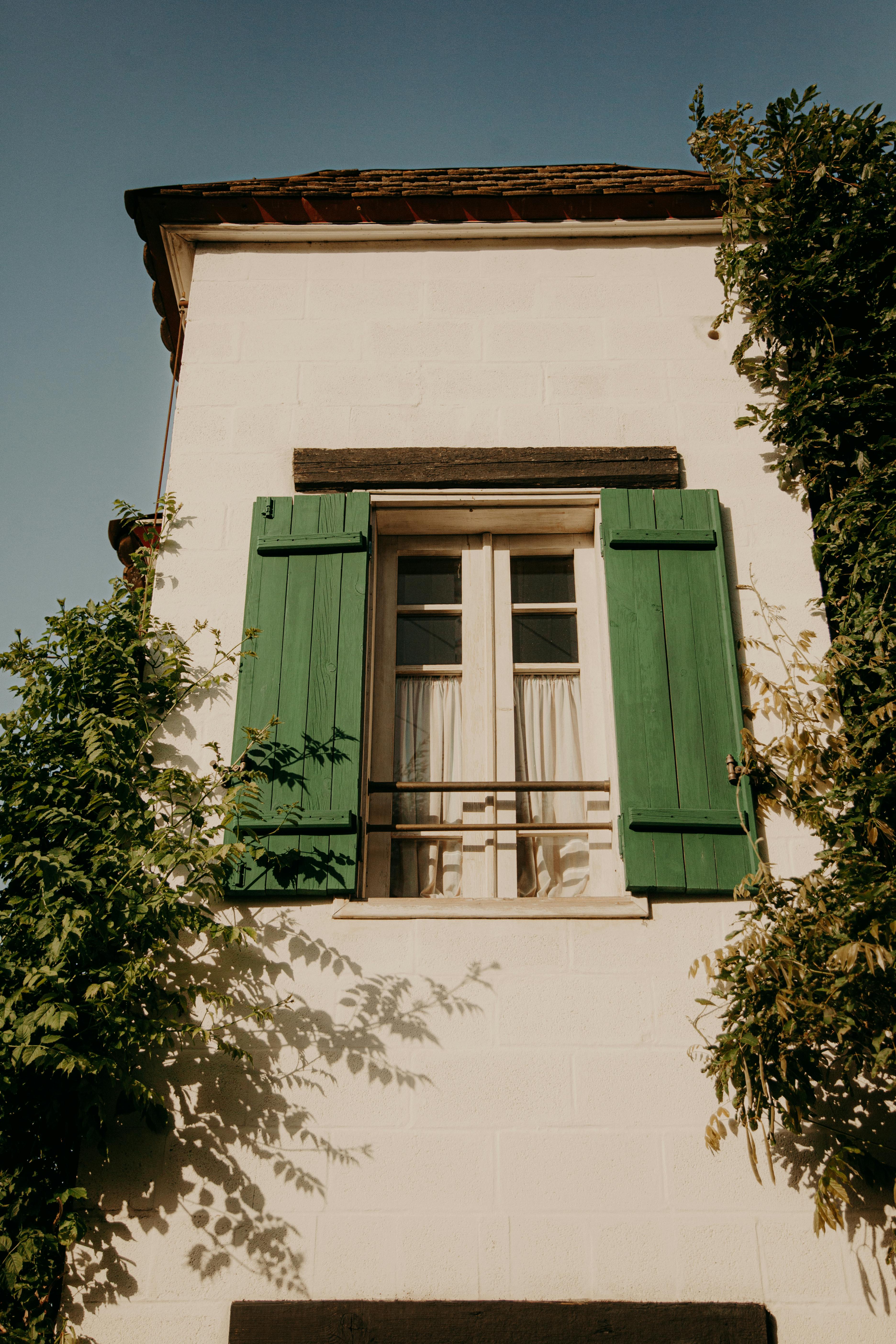 window with wooden shutters