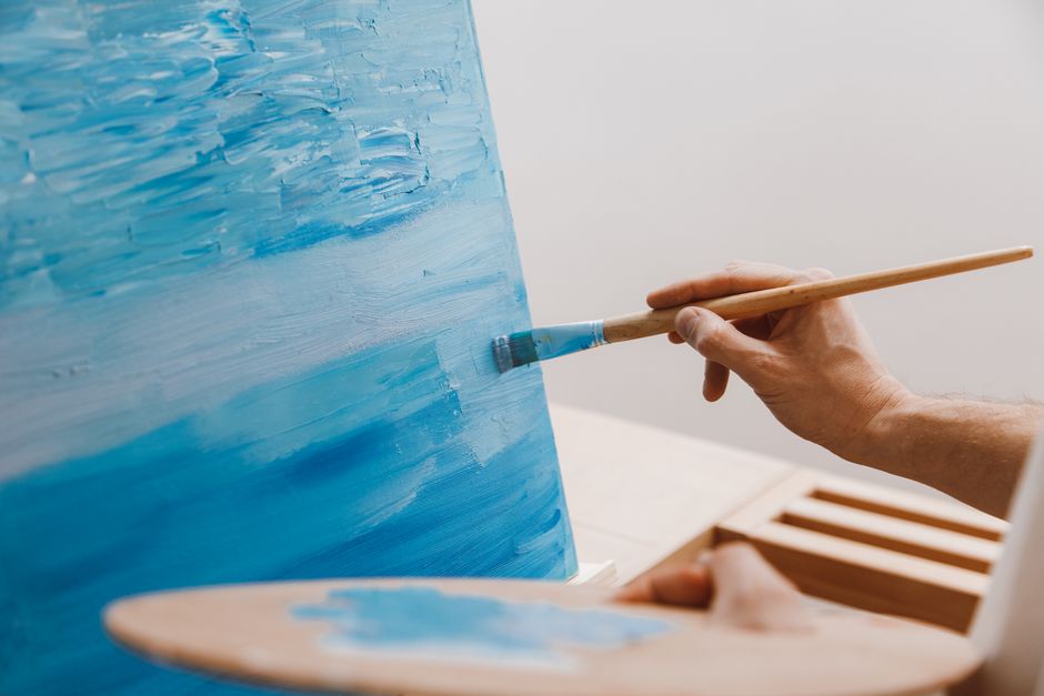 Softening the join between two sections is what stops a finished canvas reading as a coloring book