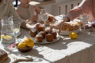 People Sitting at the Table with Food
