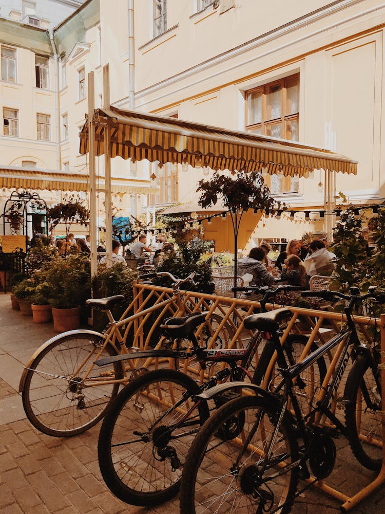 People Eating On A Al Fresco Restaurant 