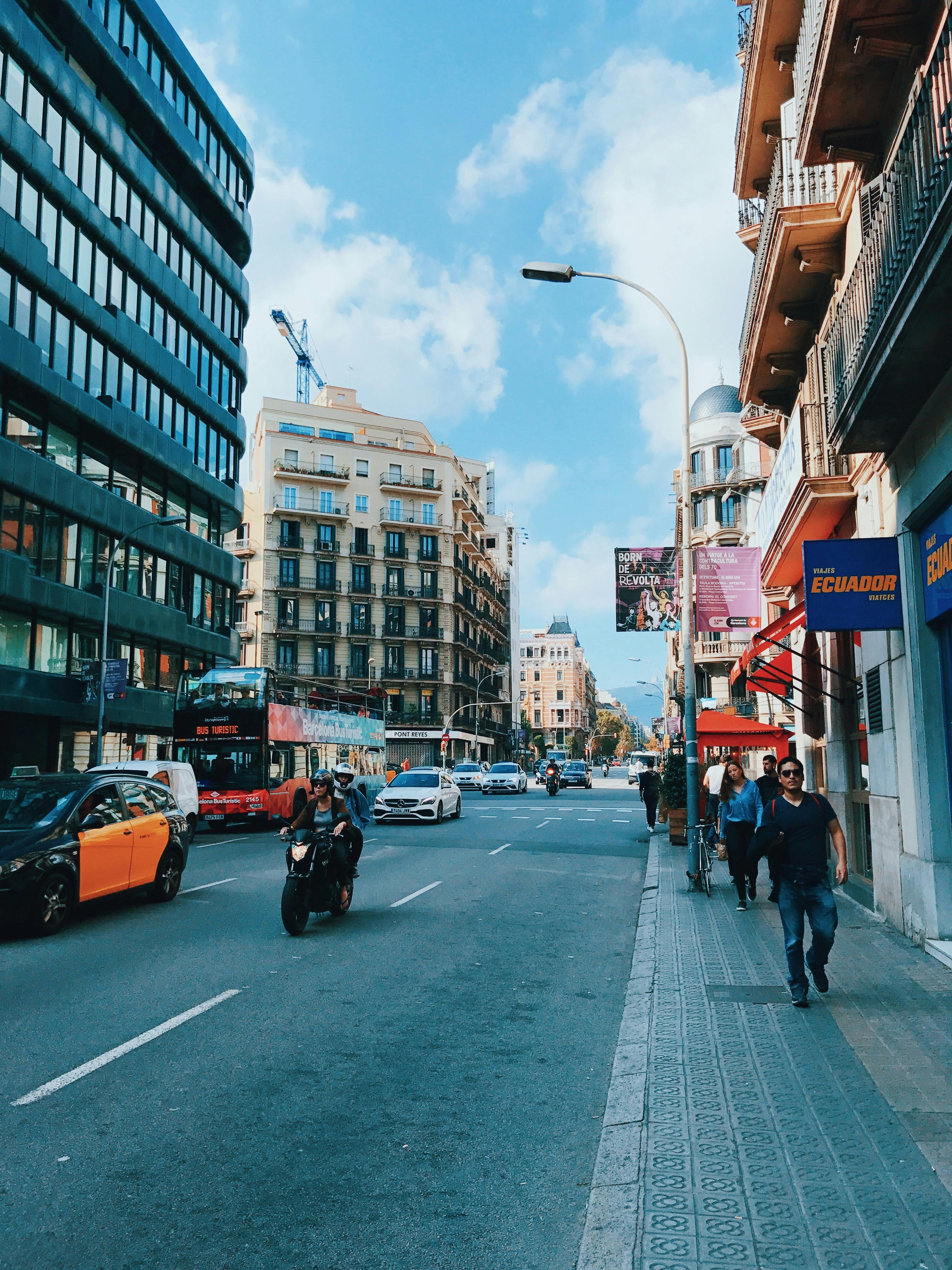 people walking on the sidewalk