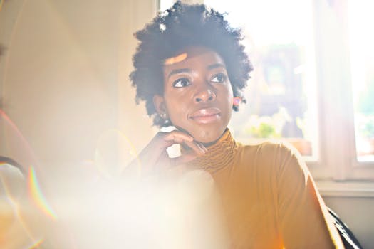Woman In Yellow Turtle-neck Long-sleeved Top Posing For Photo