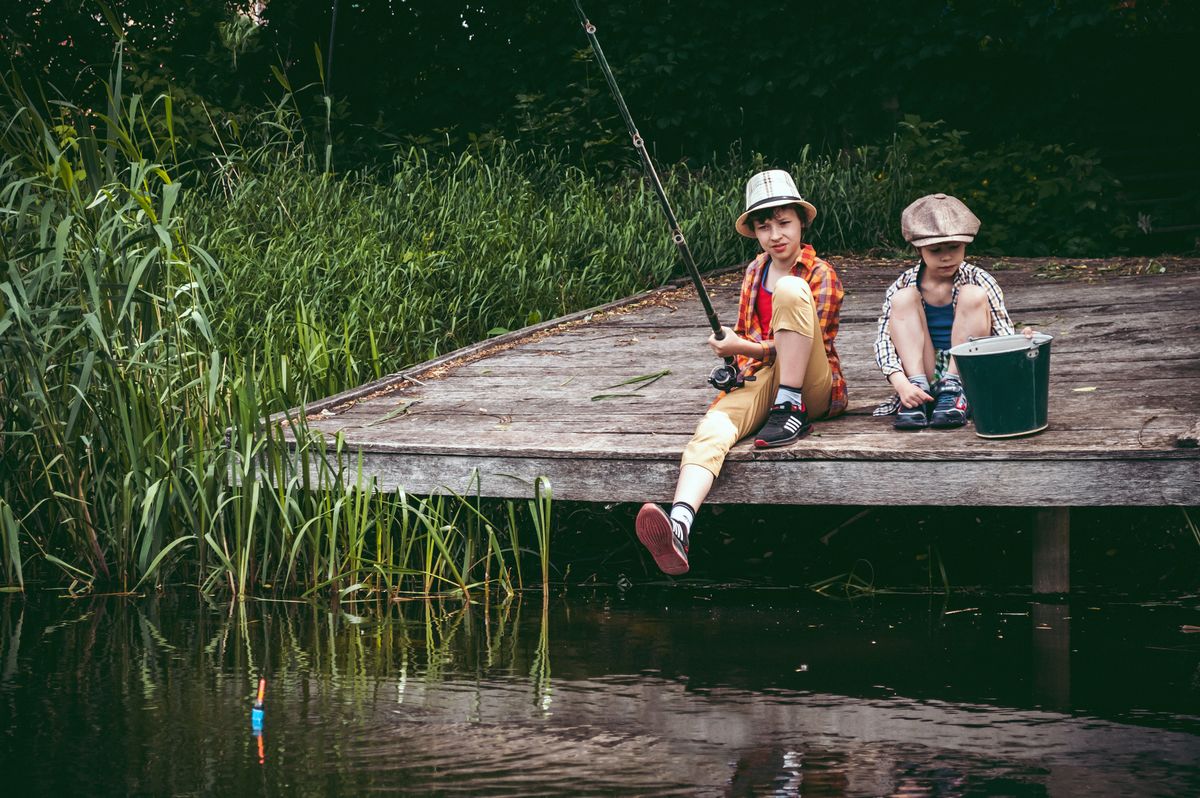 Kid fishing at lake