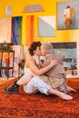 Man and Woman Sitting on Floor