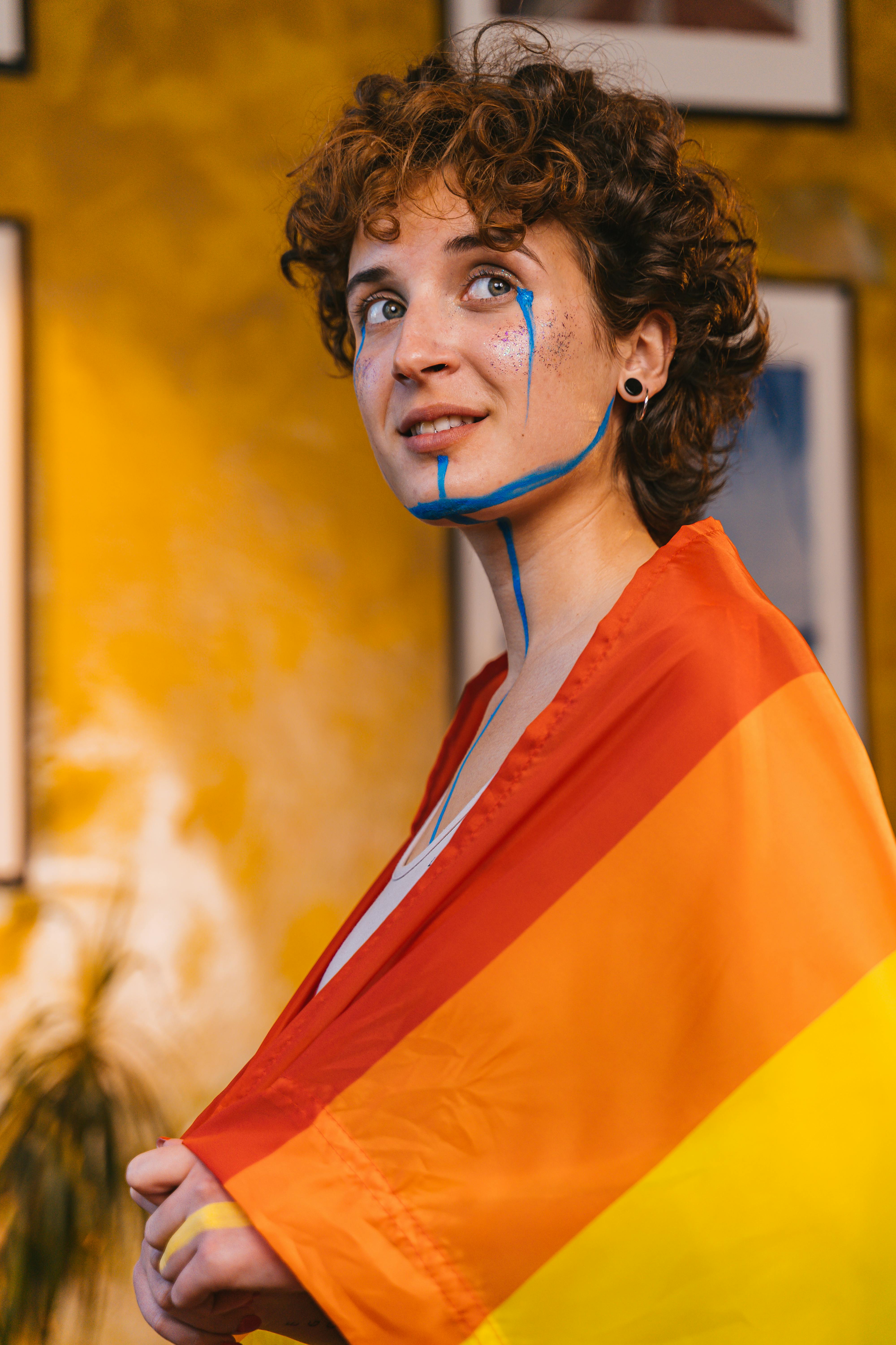 a woman with blue paint on her face