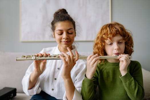 A young boy learning flute from a female teacher at home, fostering musical skills.