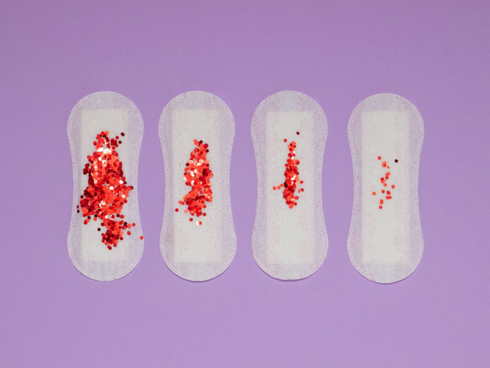 red glitter on sanitary pads