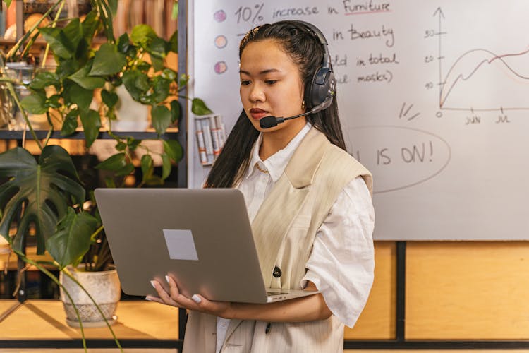 Woman With Laptop At Work