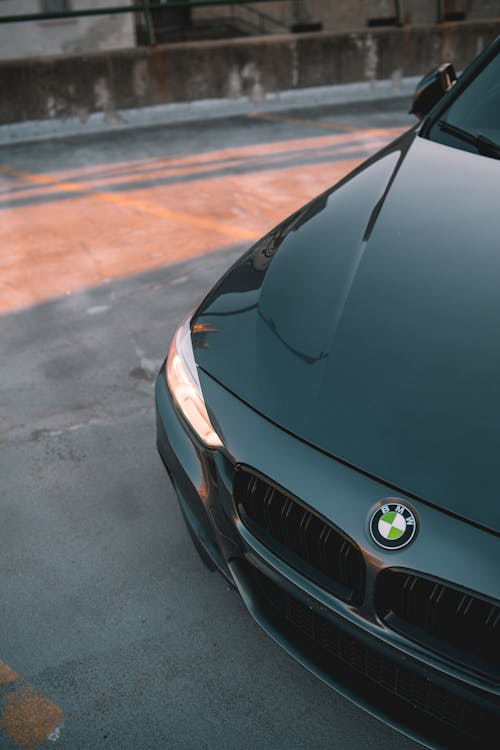 A Black Bmw Car on the Road