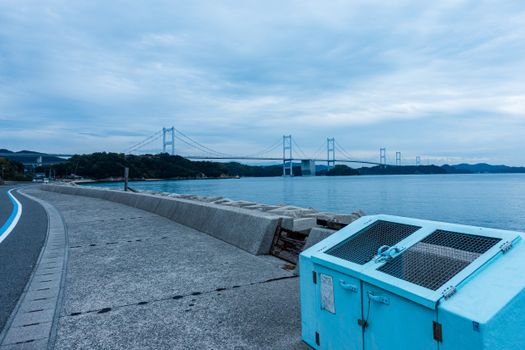 Paved Sidewalk Towards a Bridge