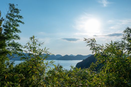 Bright Sun over Mountains and Sea