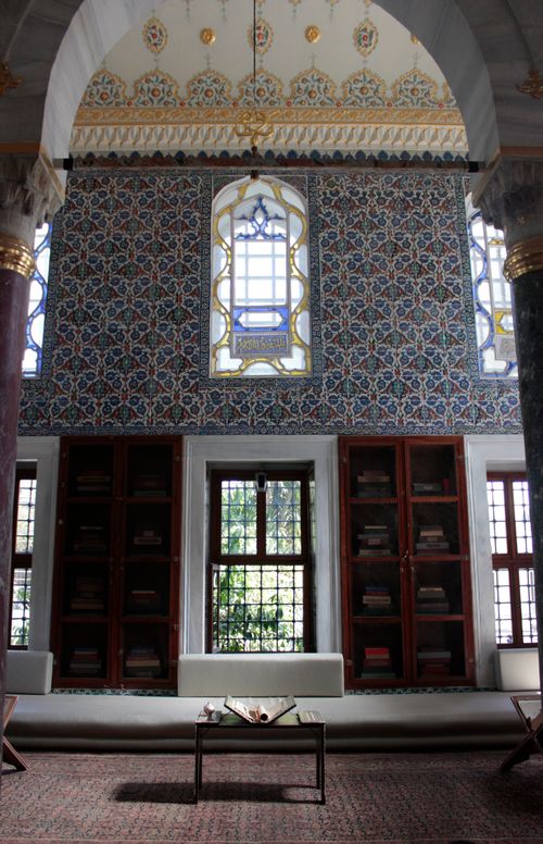 Free Opulent interior featuring patterned tiles, arched windows, and luxurious design elements. Stock Photo