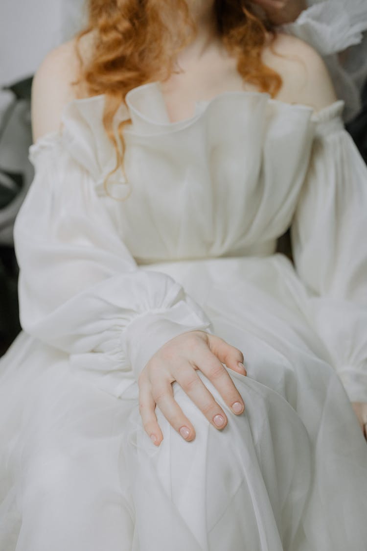 Woman In White Long Sleeve Dress