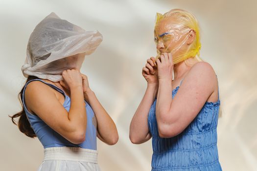 Women Suffocating Wearing Plastic Bags on Their Heads