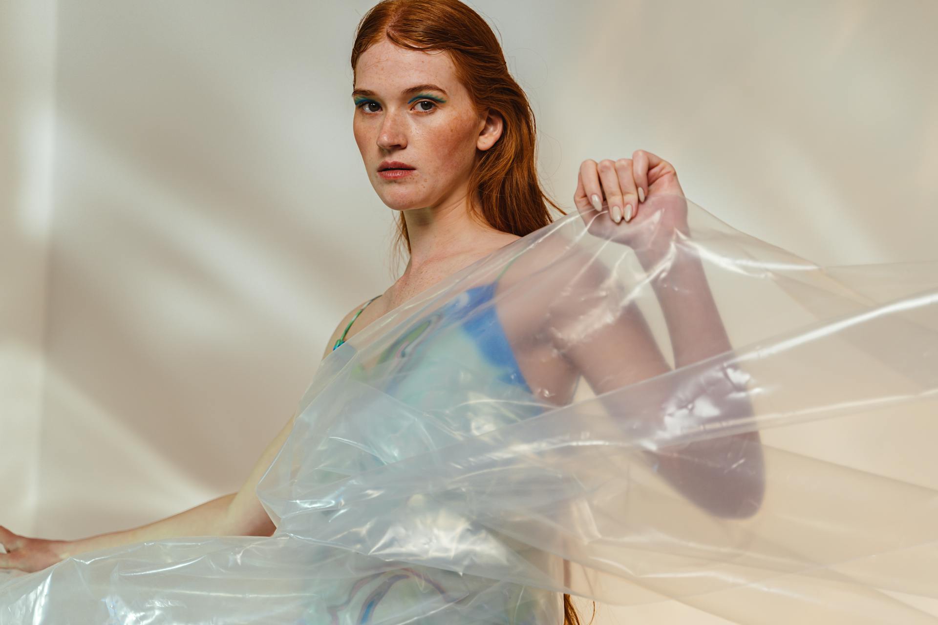 Woman Holding a Plastic Wrap posing