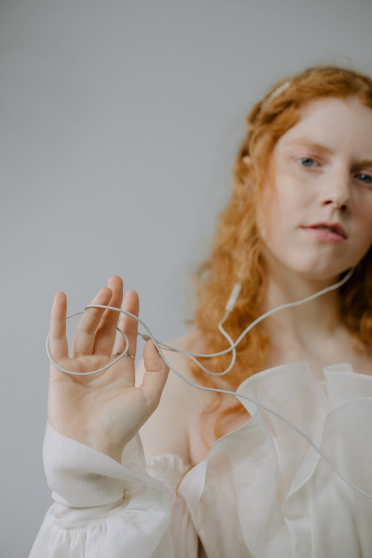 Cable Wrapped Around A Woman's Hand