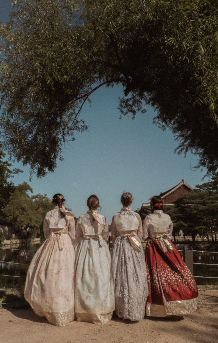 Group Of Women In Long Dresses