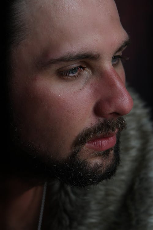 Free Close-Up Shot of a Bearded Man Stock Photo