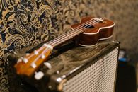 Brown and Black Acoustic Guitar