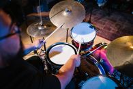 Person Playing Drum