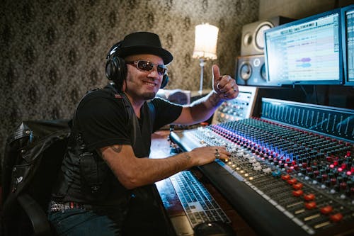 Free Man Working inside a Recording Studio Stock Photo