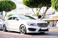 White Car Parked Near Trees