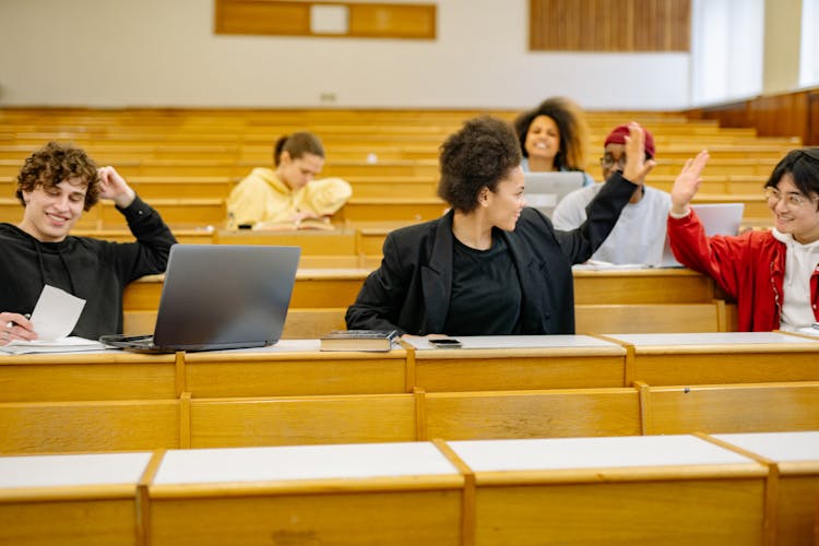 Students Sitting In The Classroom