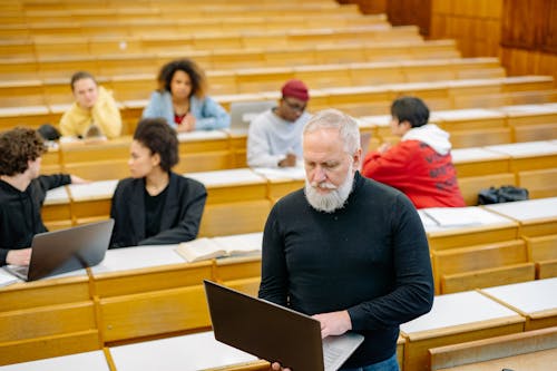 A Man using a Laptop