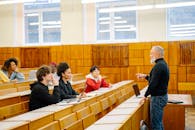 Man Teaching Students in a University