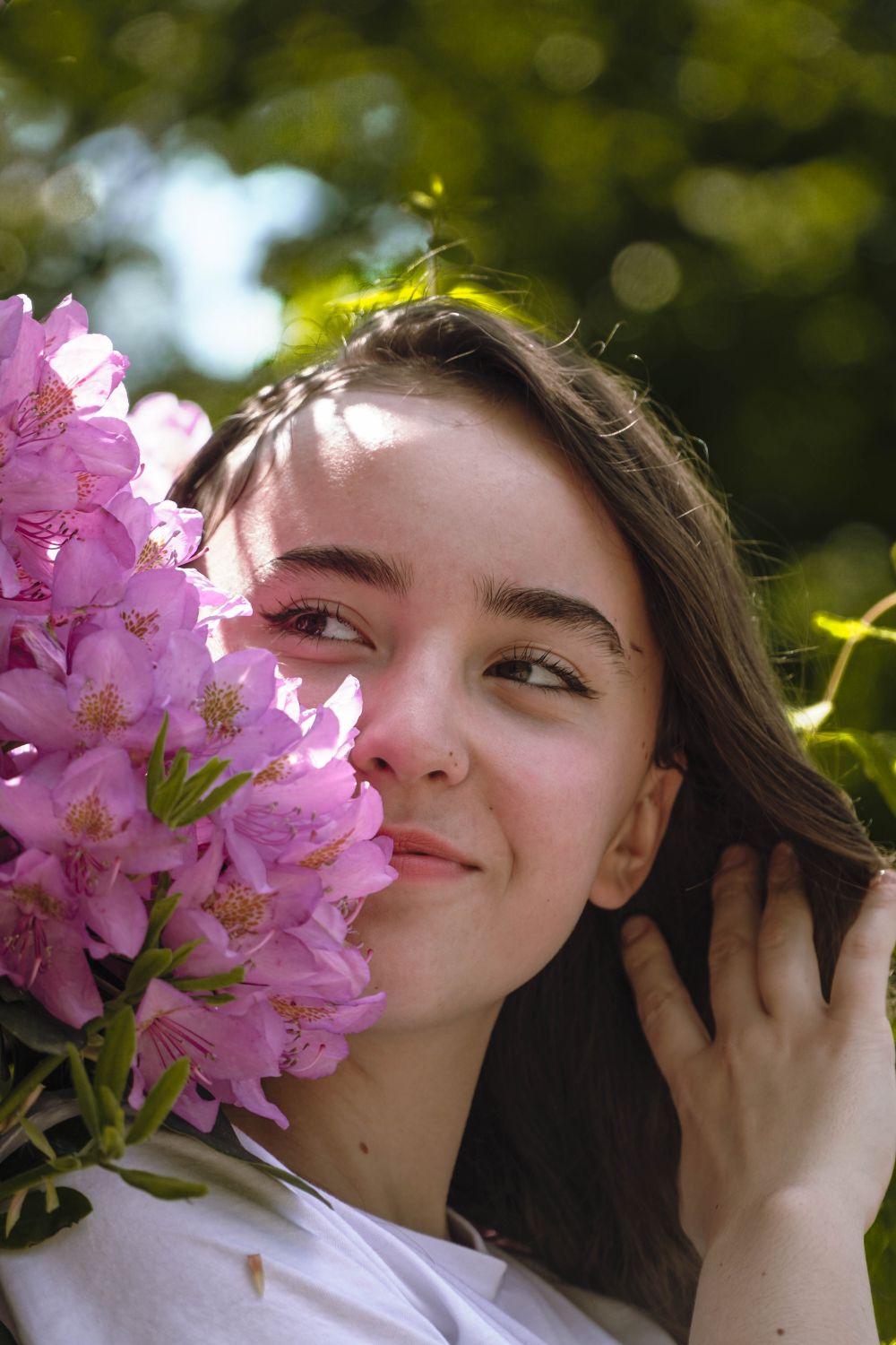 Woman Near Pink Flowers · Free Stock Photo