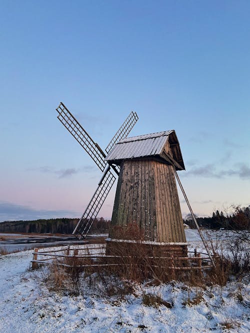 Free Brown Wooden Windmill Under Blue Sky Stock Photo