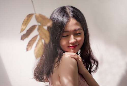 Free Woman Wearing Brown Sleeveless Top Stock Photo