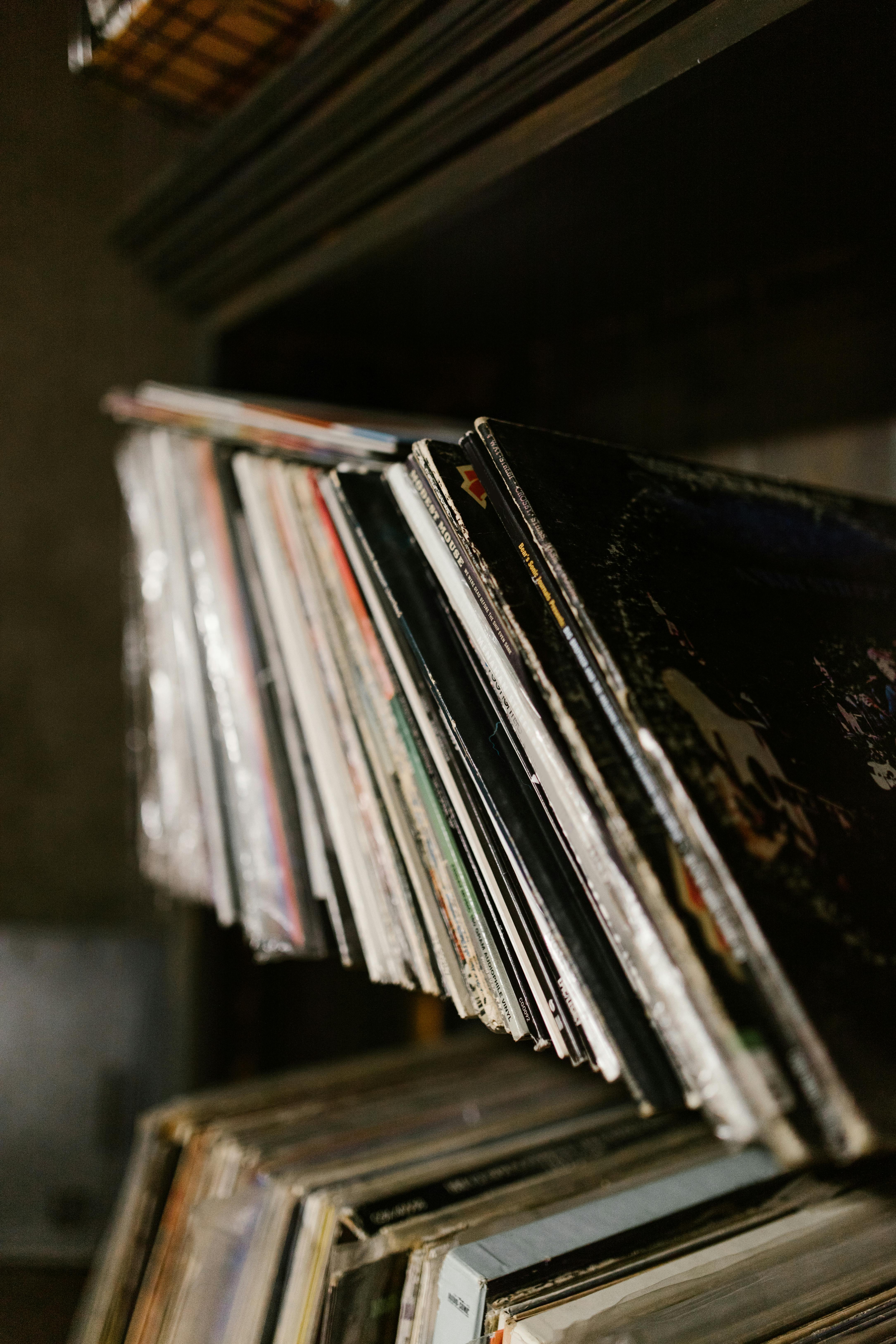 close up of old music records standing on a shelf