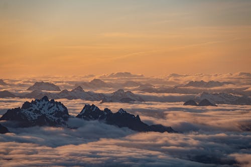 Clouds over Mountains at Dawn