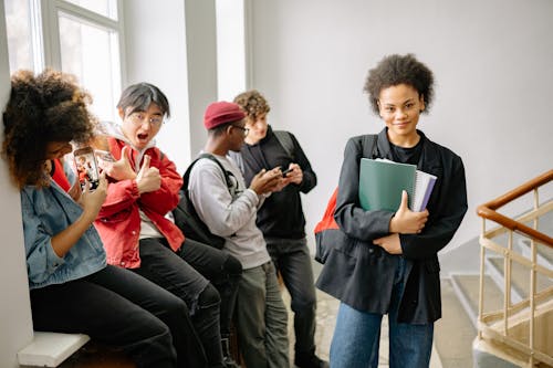 College Students Waiting on a Staircase