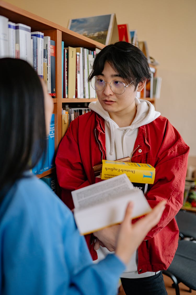 Students Talking At The Library