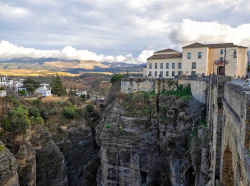 Buildings Near Canyon and Rock Formation