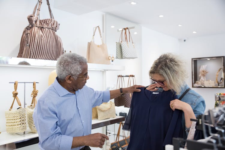 Elderly Couple Doing Shopping In Store