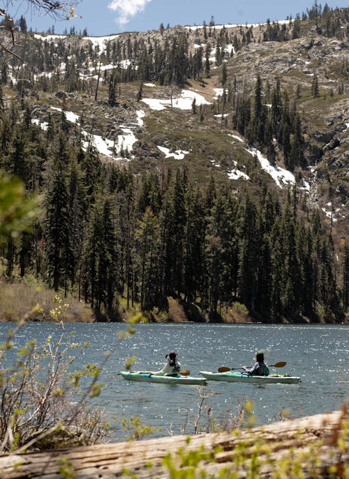 Two People Riding Kayak on a Lake