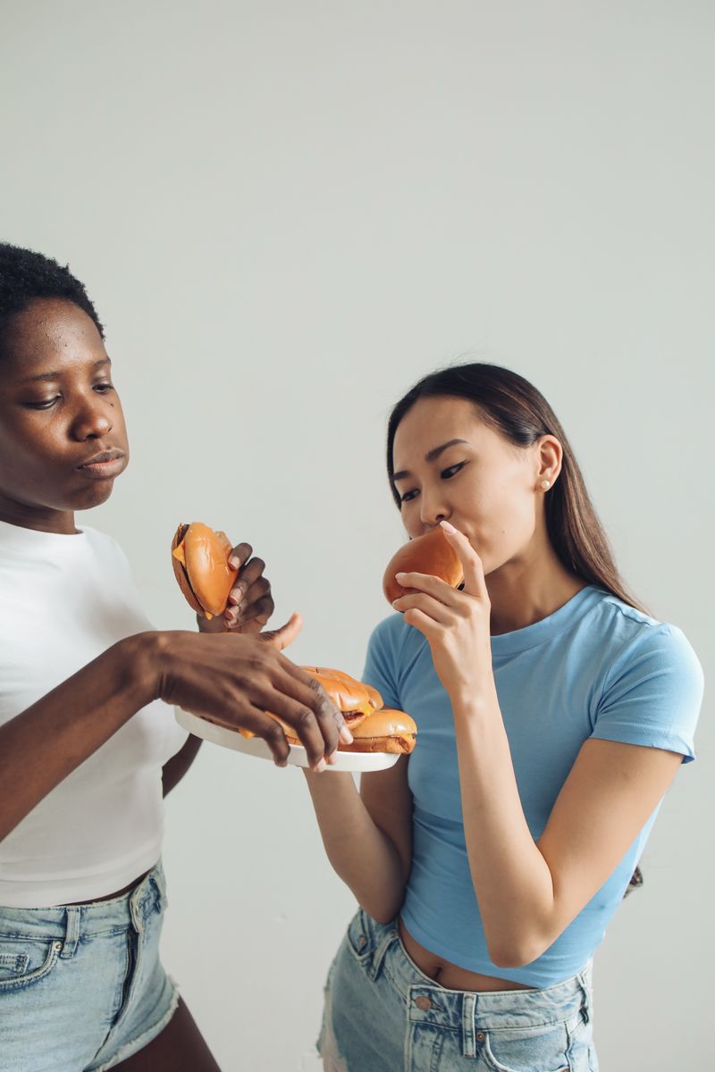 Friends eating burgers