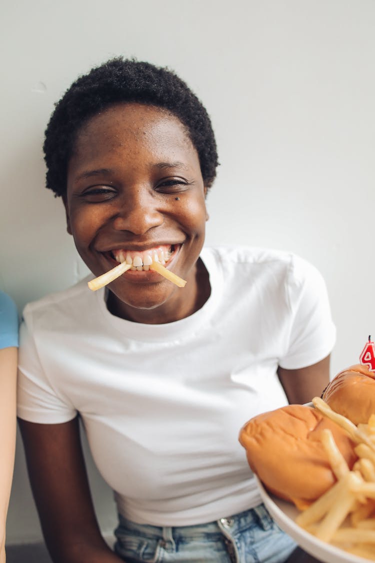 Woman Eating Fries