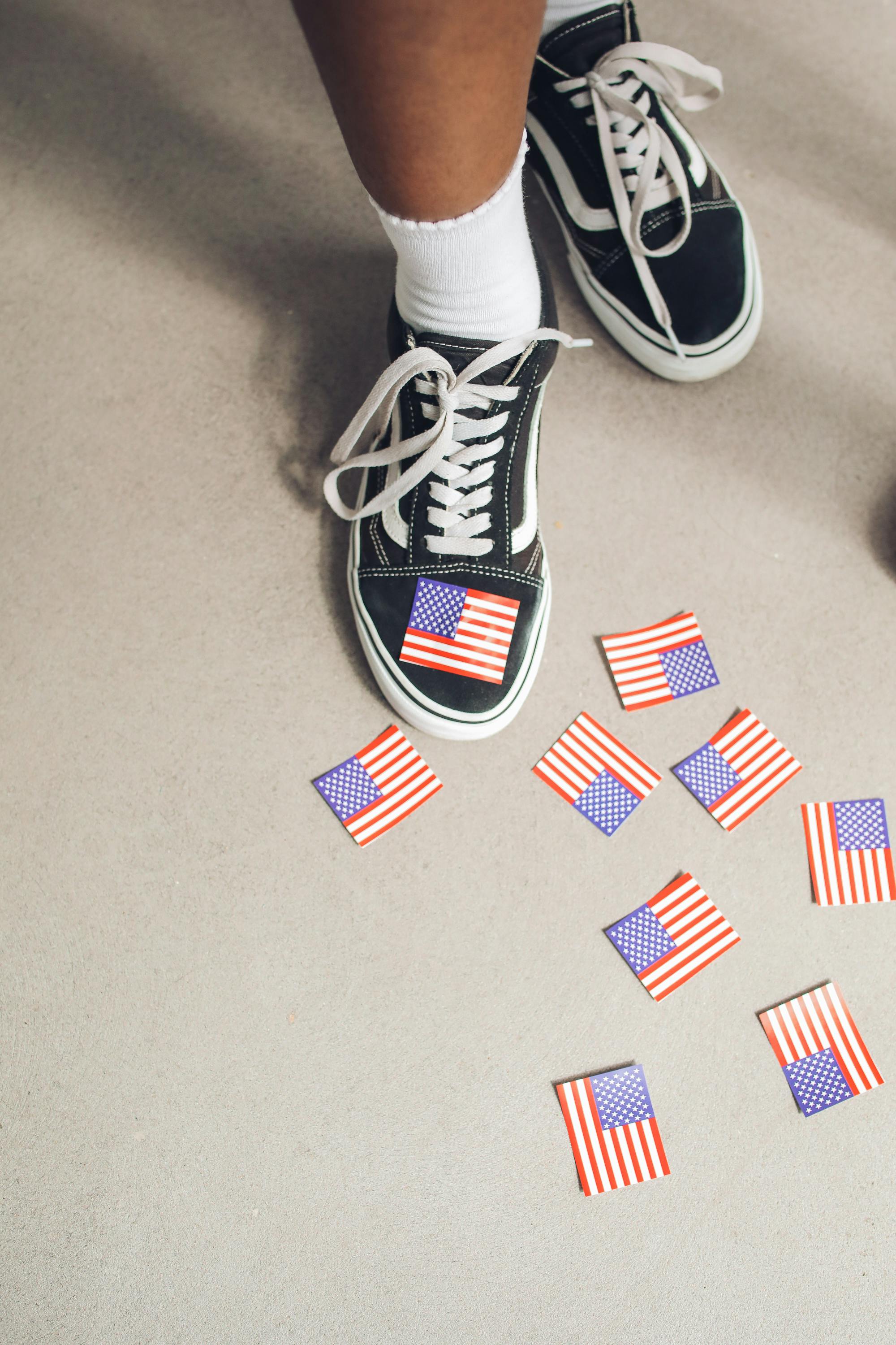 Person Wearing White Socks and Black and White Sneakers · Free Stock Photo