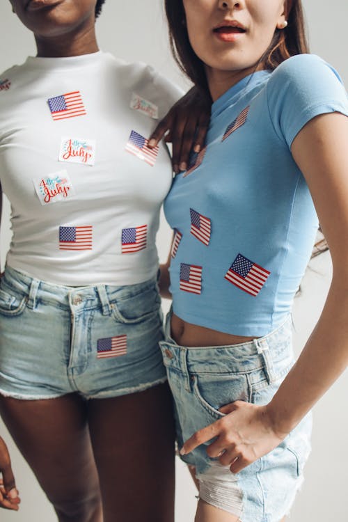 Women Wearing T-Shirts with Stickers