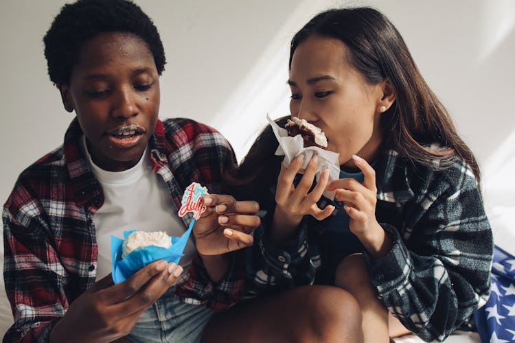 Women Eating Cupcakes