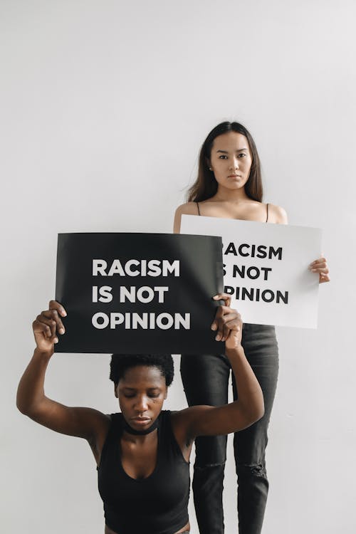 Women Holding Posters on Activism